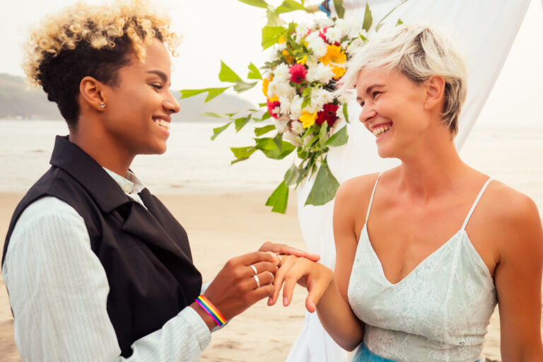 african-american-female-groom-in-black-suit-and-ha-2022-05-01-23-40-51-utc