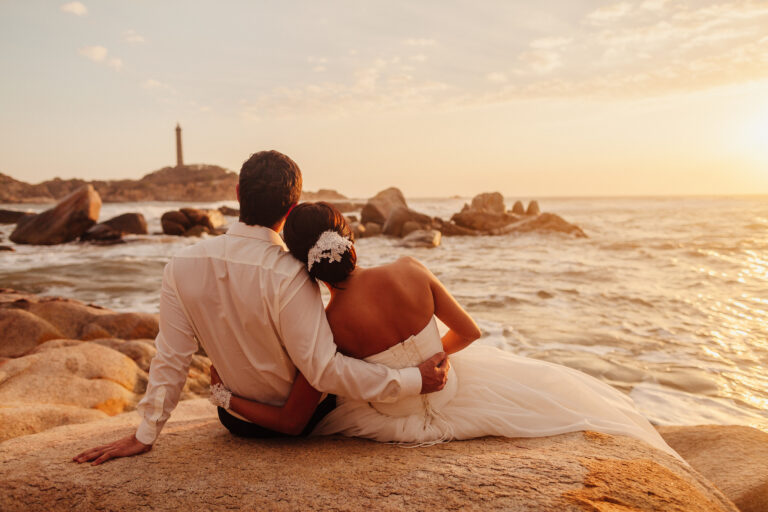 honeymoon-couple-relax-on-sunset-beach-2022-02-02-03-59-45-utc