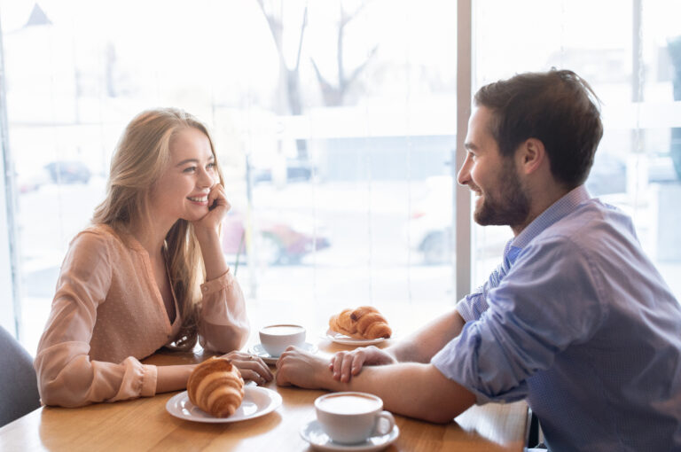 positive-young-couple-having-breakfast-together-at-2022-12-16-07-53-12-utc