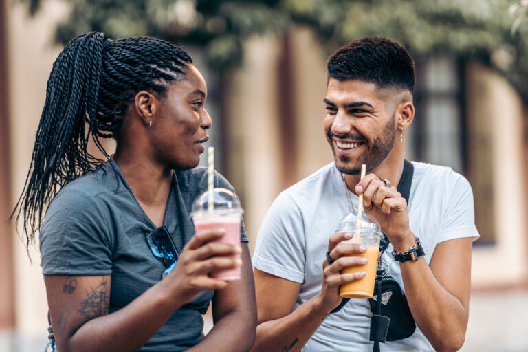 young-caucasian-man-and-young-black-woman-drinking-2022-05-06-02-19-31-utc